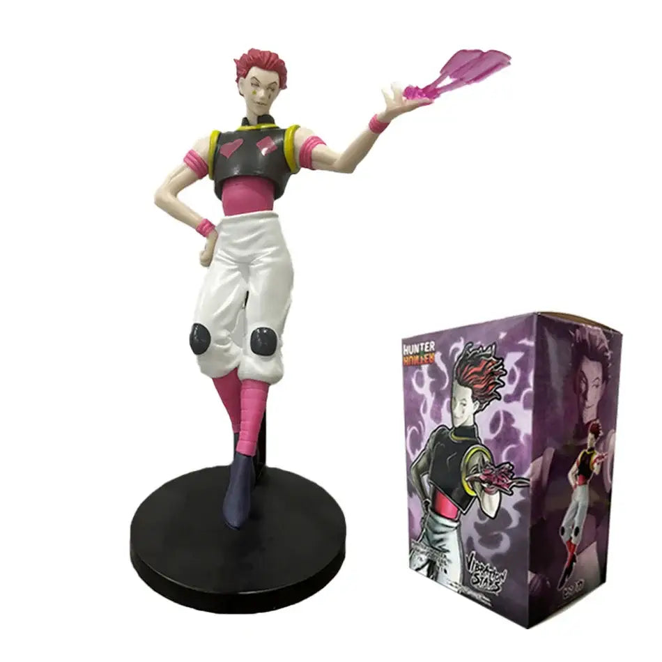 A detailed hunter x hunter gon freecss pvc figure with spiky red hair wearing black and pink outfit holding purple weapons