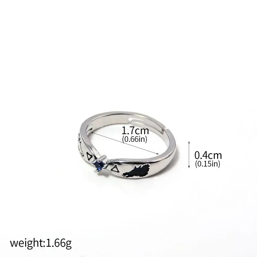 Silver adjustable jujutsu kaisen yuta okkotsu couple ring with a blue gemstone and engraved wolf silhouette