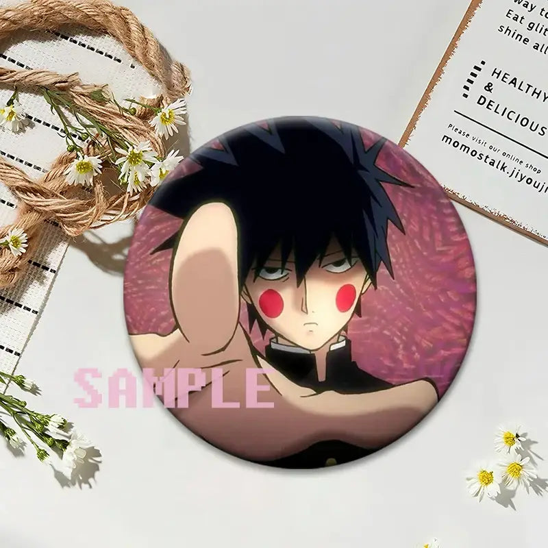 Circular mob psycho 100 shigeo kageyama button pin with black hair and red cheeks on textured pink background