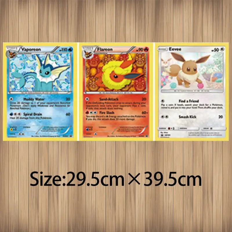 Three pokémon trading cards featuring vaporeon flareon and eevee displayed on wood for pokemon eevee vaporeon wall art lenticular poster