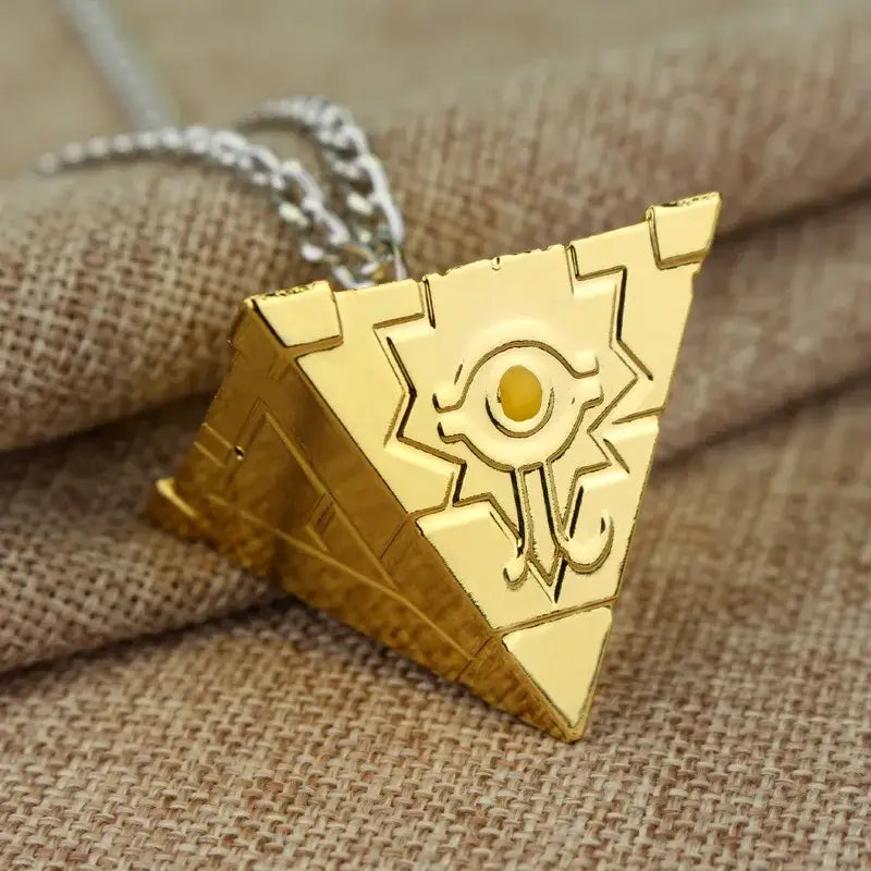 Golden alloy yu-gi-oh yugi millennium pendant necklace with intricate eye emblem and yellow center design