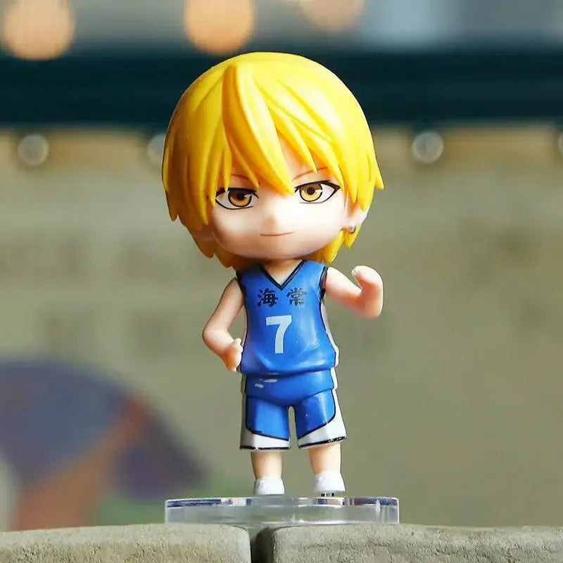 Chibi-style pvc figurine of kuroko tetsuya in blue basketball jersey number 7 on clear plastic base for collection