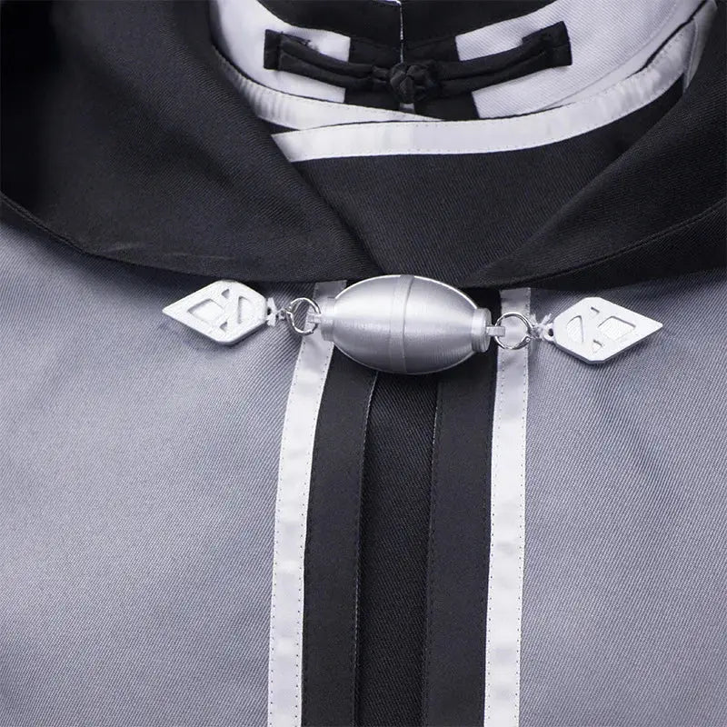 Silver metallic clasp with oval body and diamond-cut ends on black-and-white hooded mushoku tensei rudeus cosplay adulthood uniform set