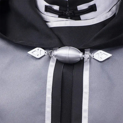 Silver metallic clasp with oval body and diamond-cut ends on black-and-white hooded mushoku tensei rudeus cosplay adulthood uniform set