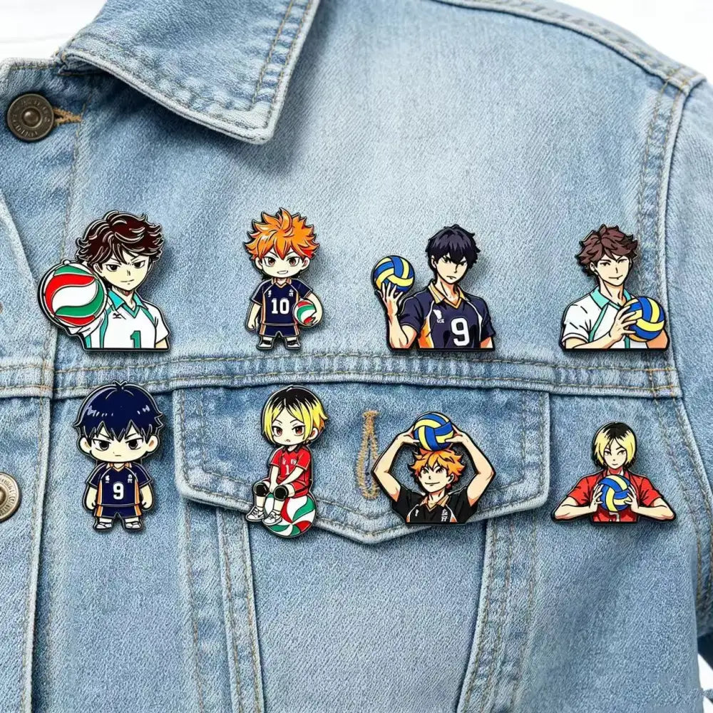 Set of eight colorful anime volleyball player enamel pins in various poses on a denim jacket lapel badge gift