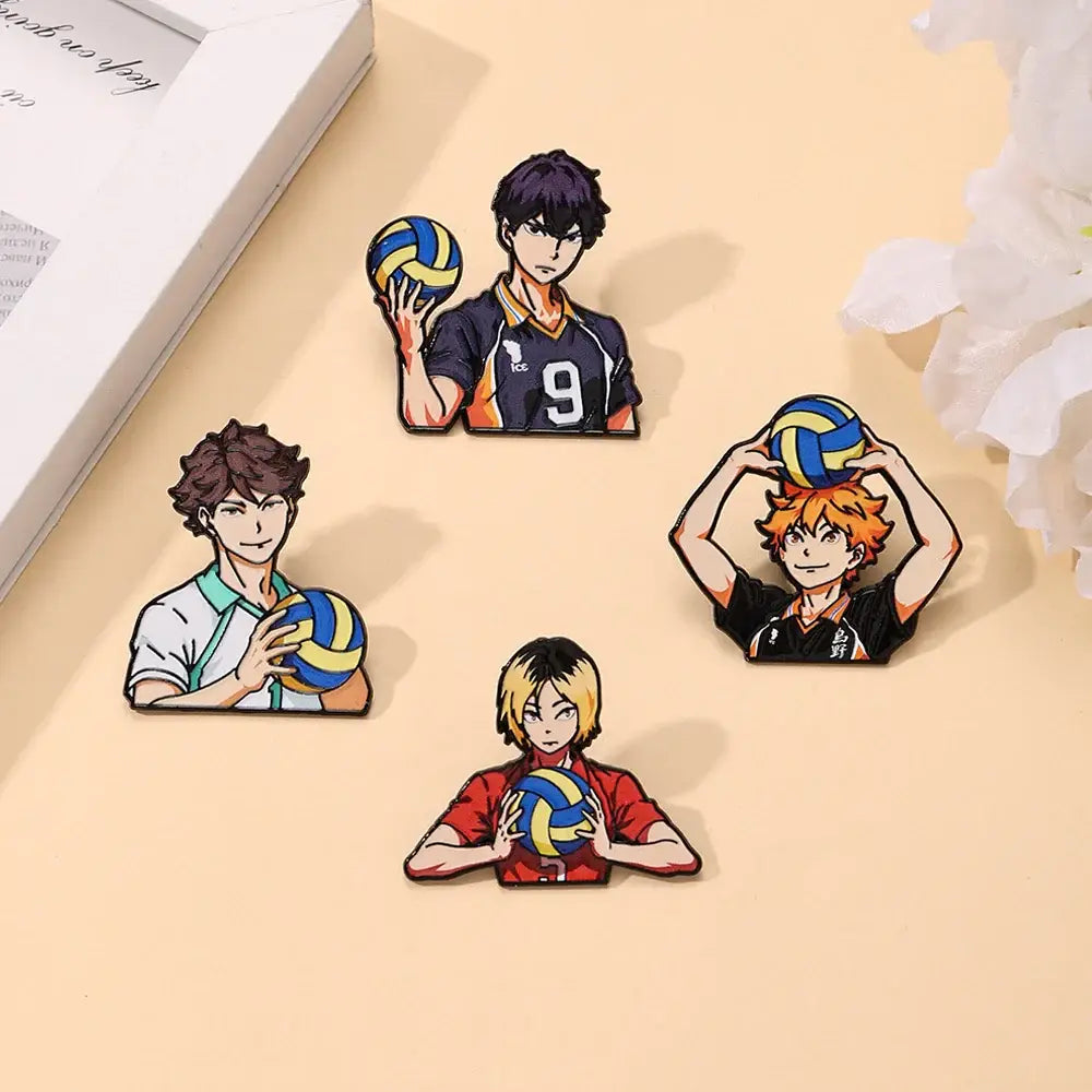 Set of four colorful anime volleyball player enamel pins featuring blue and yellow volleyballs for fashion lapel badges