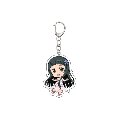 Chibi-style acrylic keychain featuring a long black haired character in a pink dress with purple flower accessory
