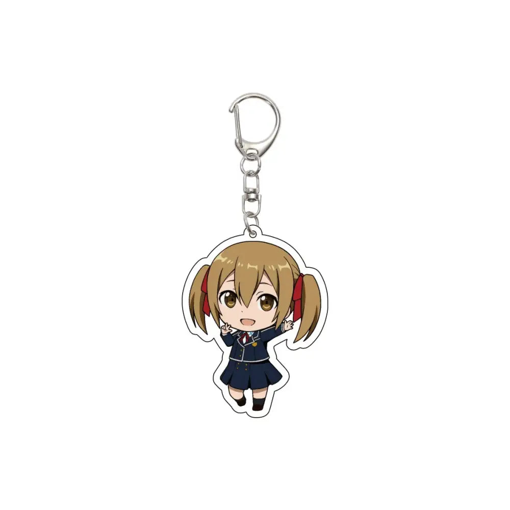 Chibi-style acrylic keychain of blonde anime girl in navy blue uniform with red ribbons attached to silver metal clip