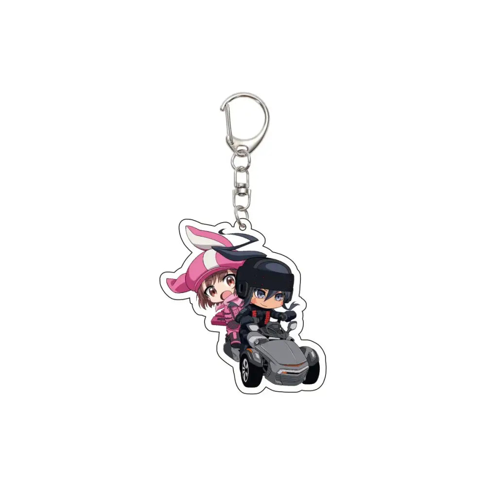 Pink and black acrylic 55mm anime sword art online keychain featuring chibi alice and kirigaya riding a go-kart