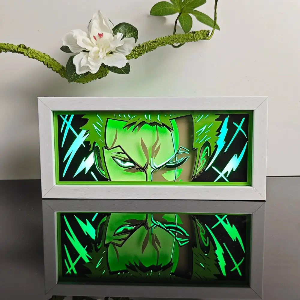 Anime 3d laser light box led night light with glowing green stylized anime face and lightning bolt in white frame