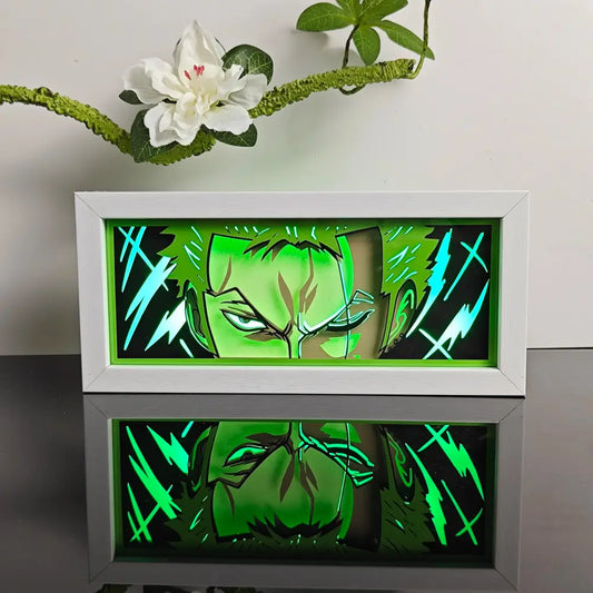 Anime 3d laser light box led night light with glowing green stylized anime face and lightning bolt in white frame