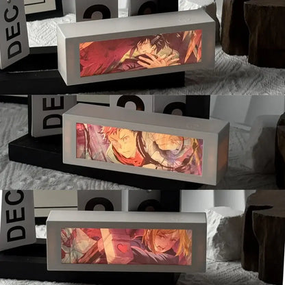 White rectangular led motion light box with vibrant red and orange anime artwork for led bedroom decor lamp