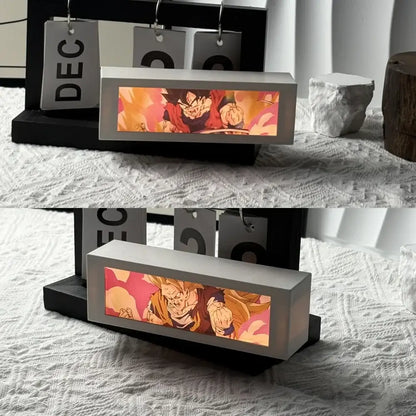 A sleek matte gray led motion light box with vibrant goku anime art for modern led bedroom decor lamp use