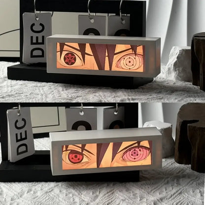 Gray rectangular anime 3d motion light box with red and orange illuminated eyes led bedroom decor lamp
