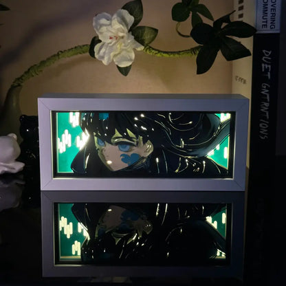 A sleek rectangular white frame anime 3d paper carved lamp with led light features black hair blue eyes character
