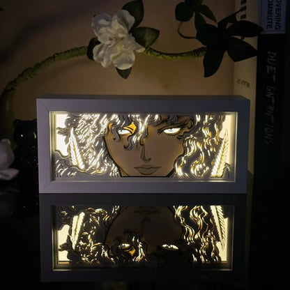 White-framed anime 3d paper carved lamp featuring curly-haired female face with golden highlights and led light box