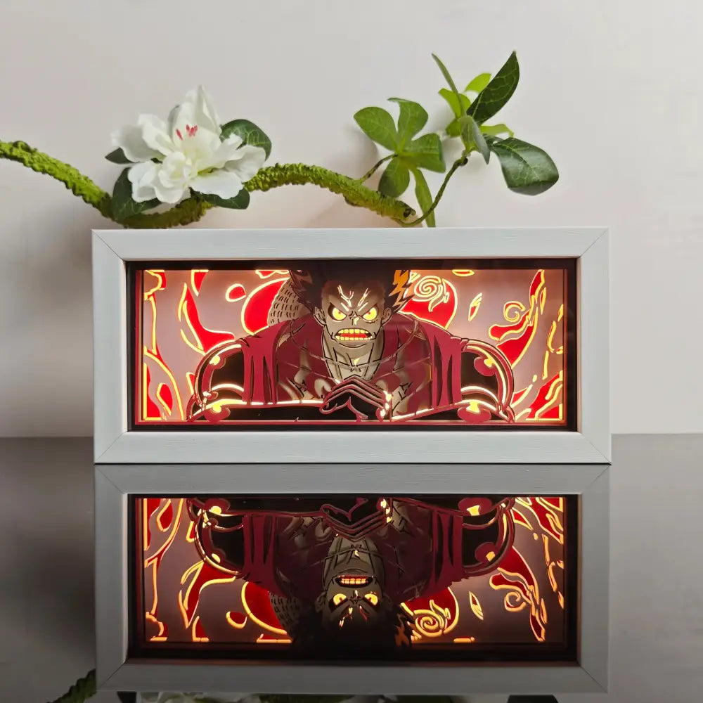 White-framed anime 3d paper carved lamp with led light box featuring menacing figure with glowing yellow eyes and red patterns