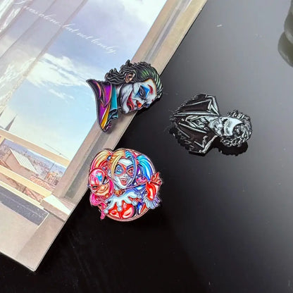 Three colorful enamel pins featuring cartoon anime joker, vampire, and harley quinn as anime badge metal lapel brooches