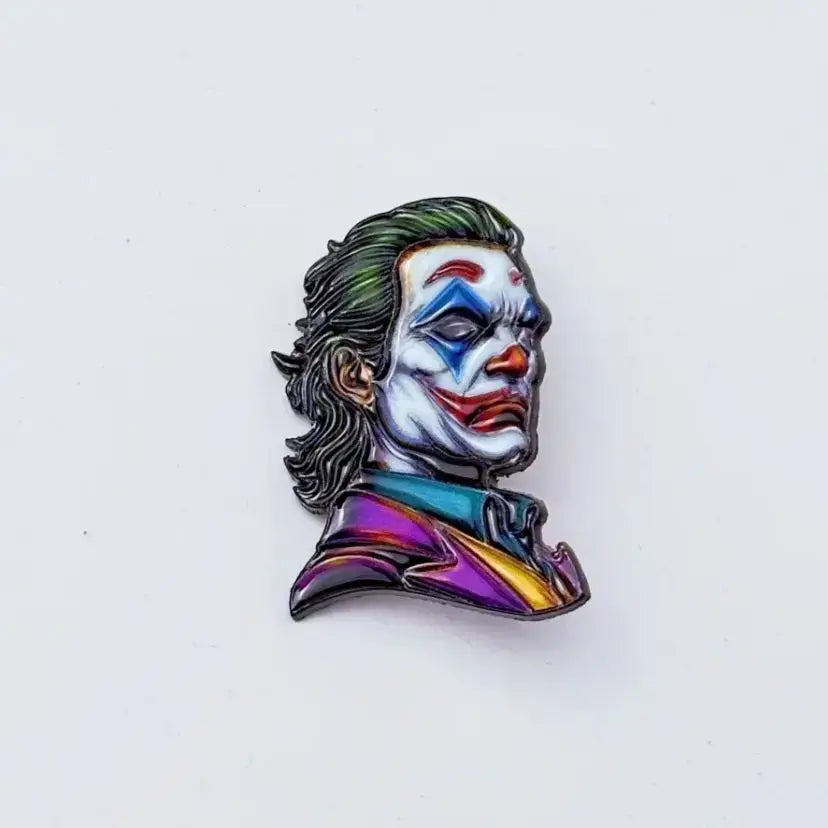 Vibrant multi-colored metal enamel pin featuring a detailed joker portrait with green hair for anime badge lovers