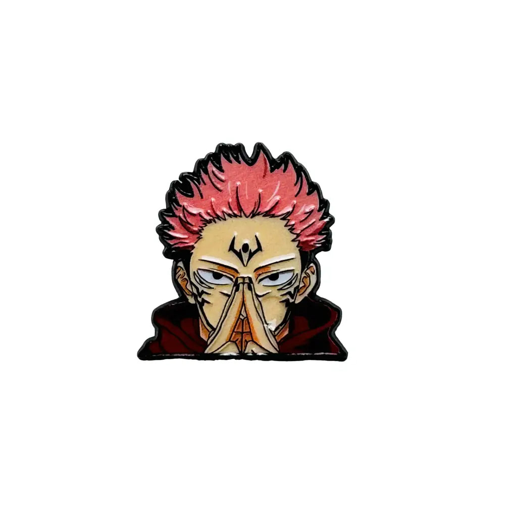 Anime boy enamel pin featuring a pink-haired character with red clothing and distinctive facial marking with black outline