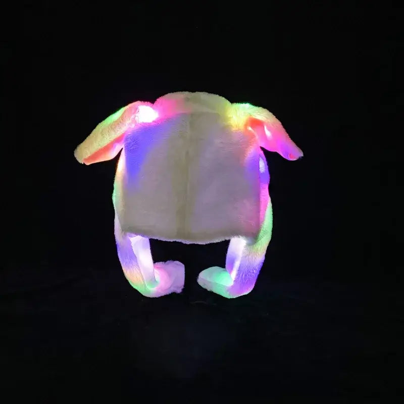 A soft plush white bunny hat with colorful led lights glowing in its ears and legs for anime cosplay