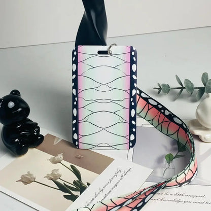 Anime card holder neck strap with a pink and black butterfly-themed phone case featuring a glossy iridescent finish and white accents