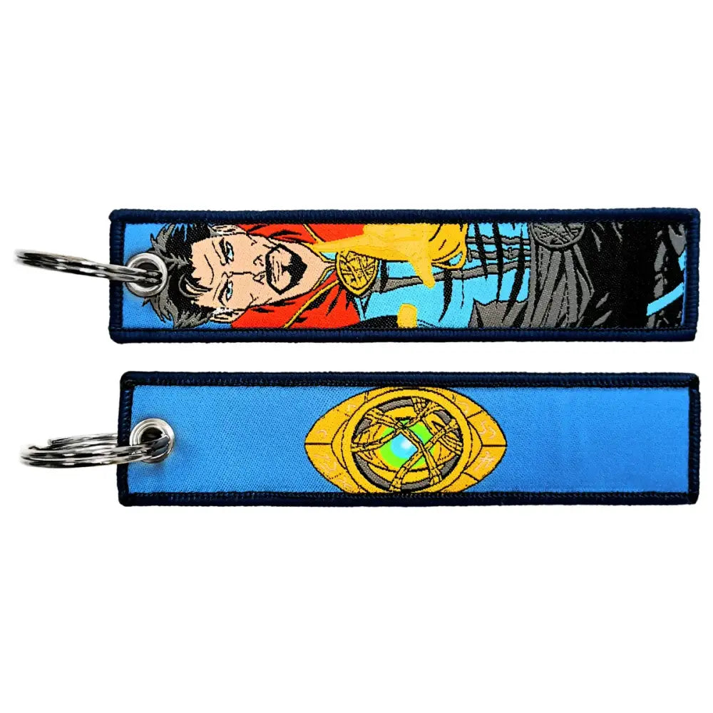 Two embroidered key fobs featuring marvel doctor strange with comic portrait and infinity gauntlet key tag design