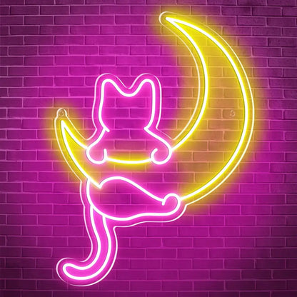 A glowing led neon sign featuring a pink anime cat sitting on a yellow crescent moon for wall decor