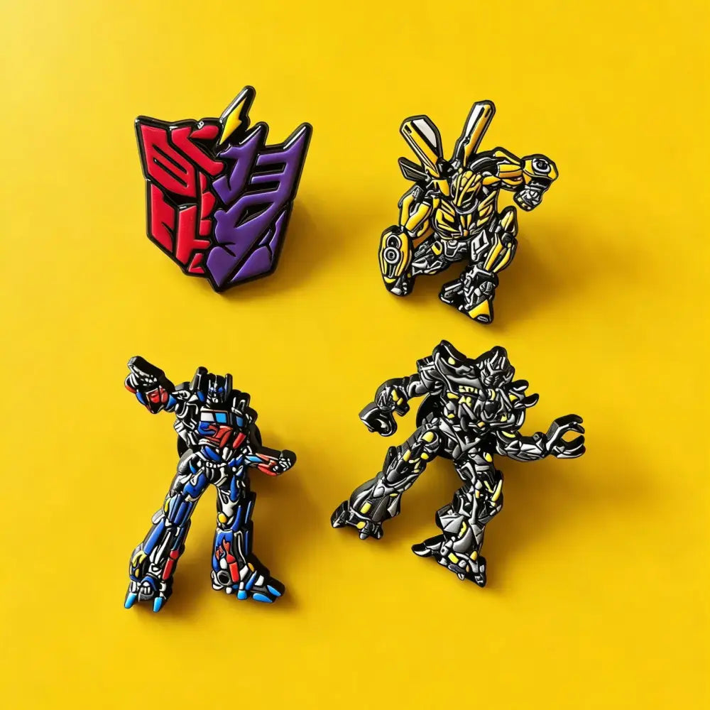 Set of four enamel brooch pins featuring transformers characters bumblebee optimus prime autobot logo black robot