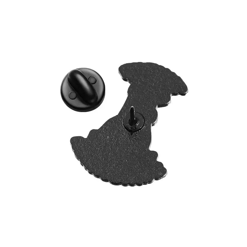Black enamel pin shaped like a stylized anime character in a flowing dress metal brooch accessory