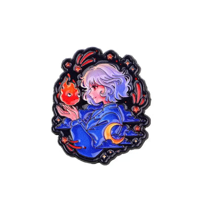 Glossy enamel pin of a silver-haired anime character in blue holding a red flame creature surrounded by stars and moons