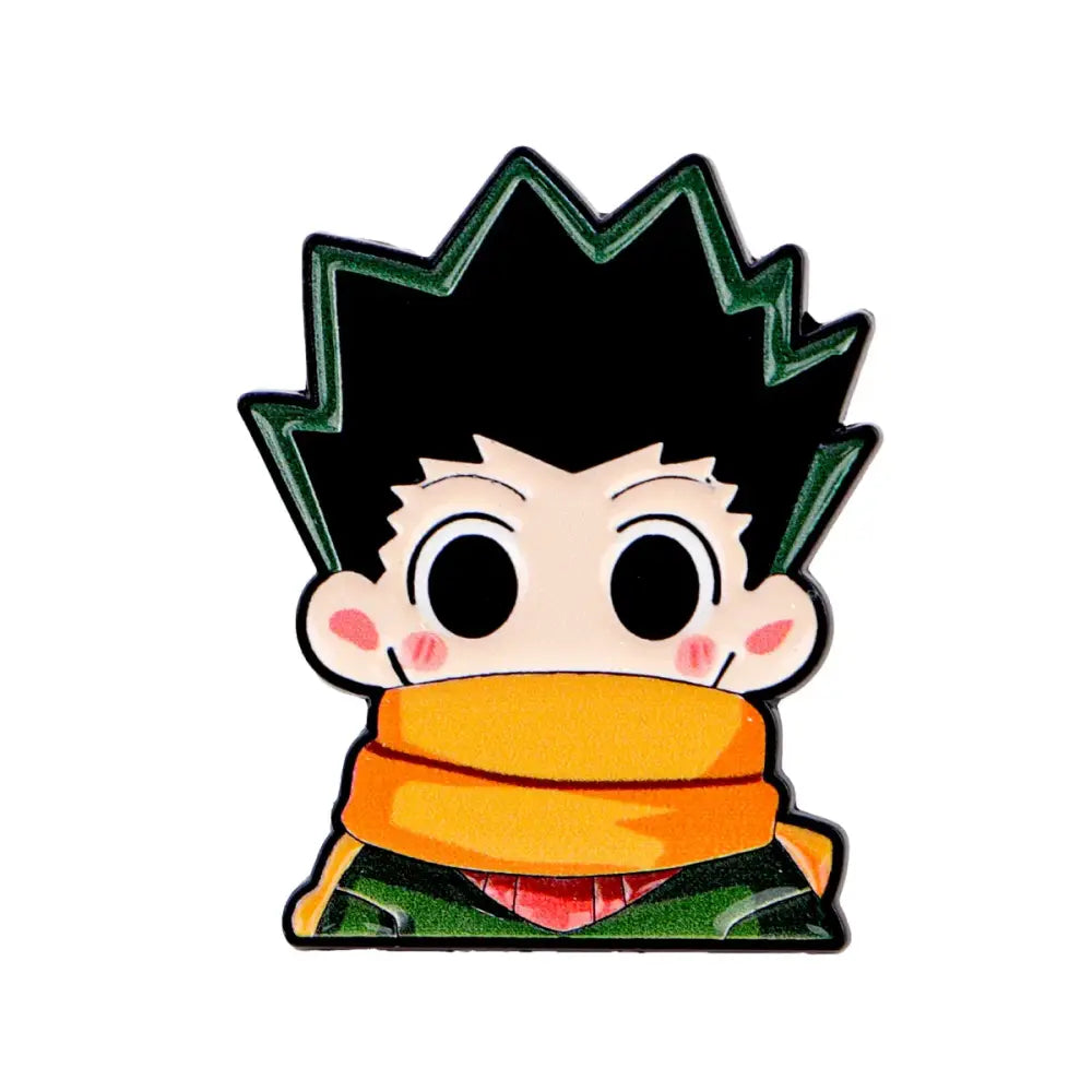 Glossy enamel pin featuring a chibi anime character with spiky black hair, green outline, rosy cheeks, and orange scarf