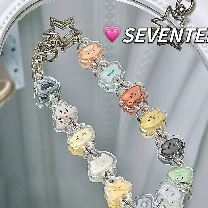 Colorful transparent acrylic anime charm bracelet keychain with cute pastel cartoon animal faces and beaded star pendant