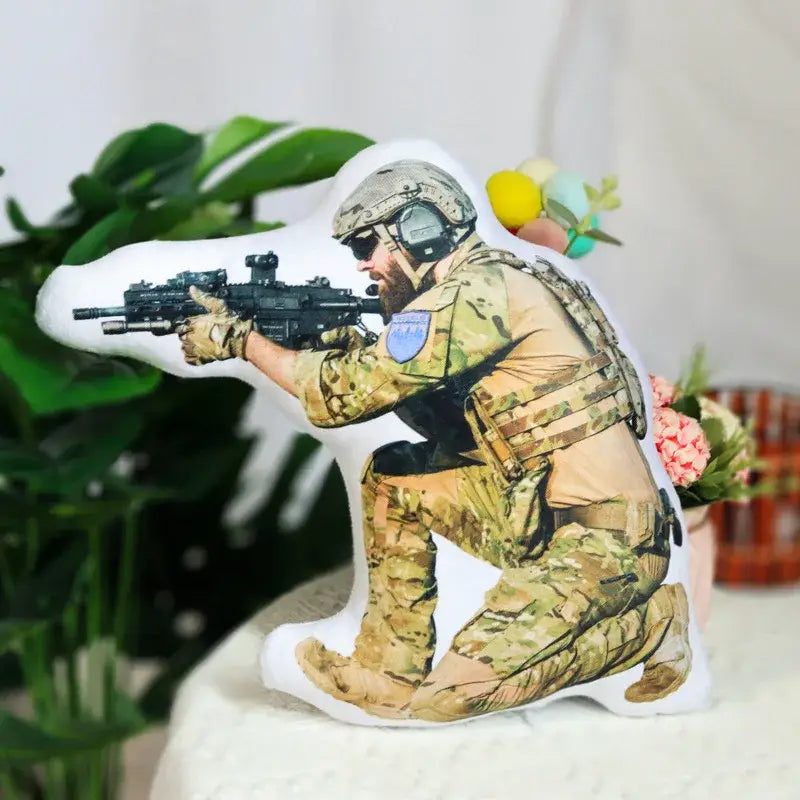 A custom couple body pillow in camouflage with detailed printed fabric featuring a personalized photo soldier design