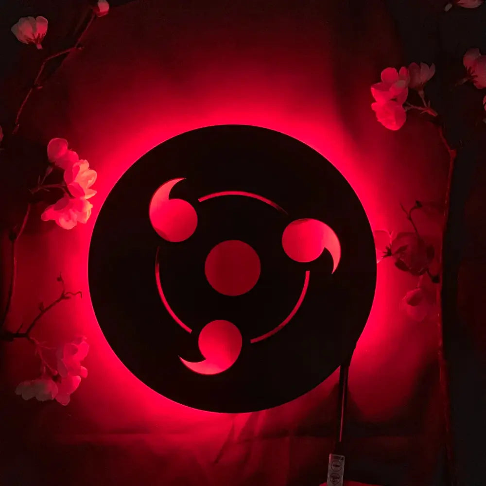 Black circular led wall lamp featuring the red glowing three-ringed sharingan symbol from naruto with remote color-changing light
