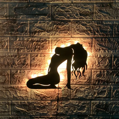 Black metal silhouette led wall lamp shaped like a woman in yoga pose with remote color-changing light