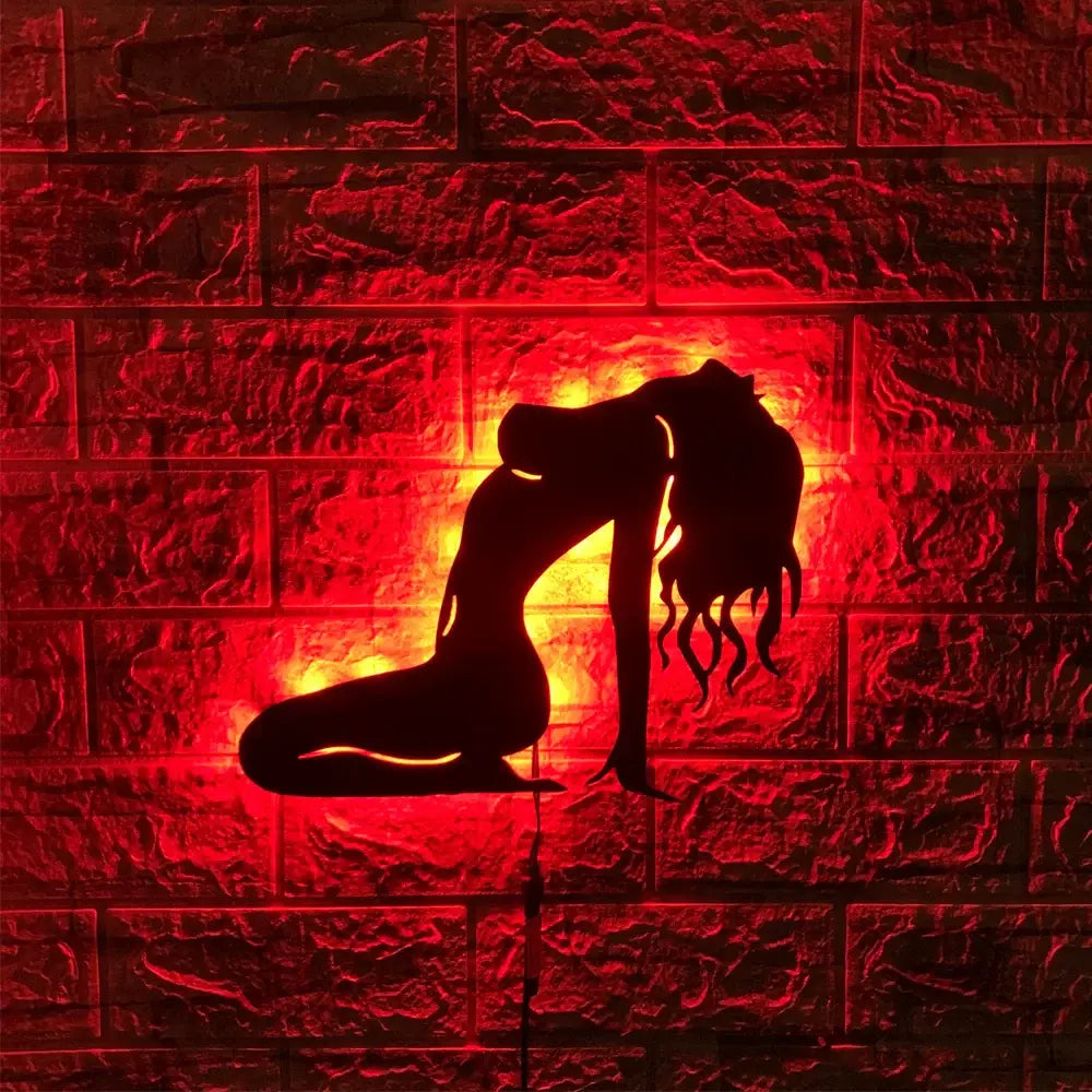 Red illuminated anime custom led wall lamp featuring a silhouette of a kneeling woman with flowing hair