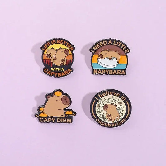 Set of four round anime enamel brooch pins with colorful capybara designs and humorous phrases for cartoon accessories