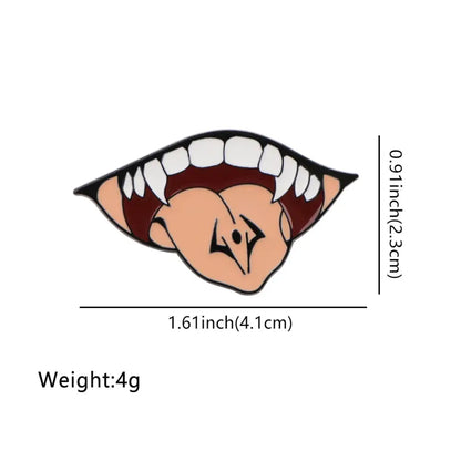 Glossy anime enamel pin cartoon featuring a stylized vampire mouth with sharp white fangs and dark red lips