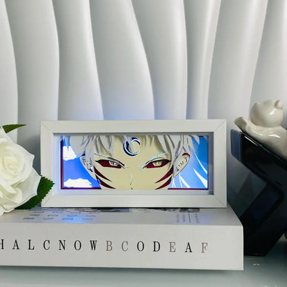 White-framed anime eyes shadow box led lamp with silver hair and red eyes featuring intricate paper carving details