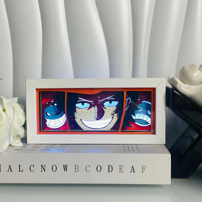 White-framed anime eyes shadow box led lamp light box with blue-eyed character glowing against red background desk lamp