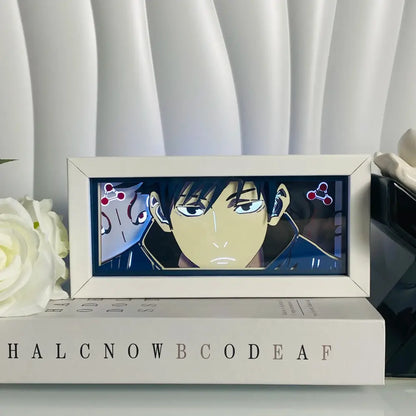 A sleek white-framed anime eyes shadow box led lamp with 3d paper carving and glowing portrait on deep blue background