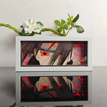 White-framed illuminated naruto uzumaki anime eyes shadow box led light box with glowing red eyes and 3d paper carving