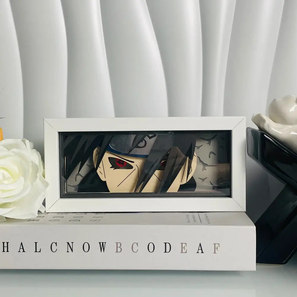 White-framed naruto uzumaki anime eyes shadow box led lamp with 3d paper carving featuring red eye and black hair