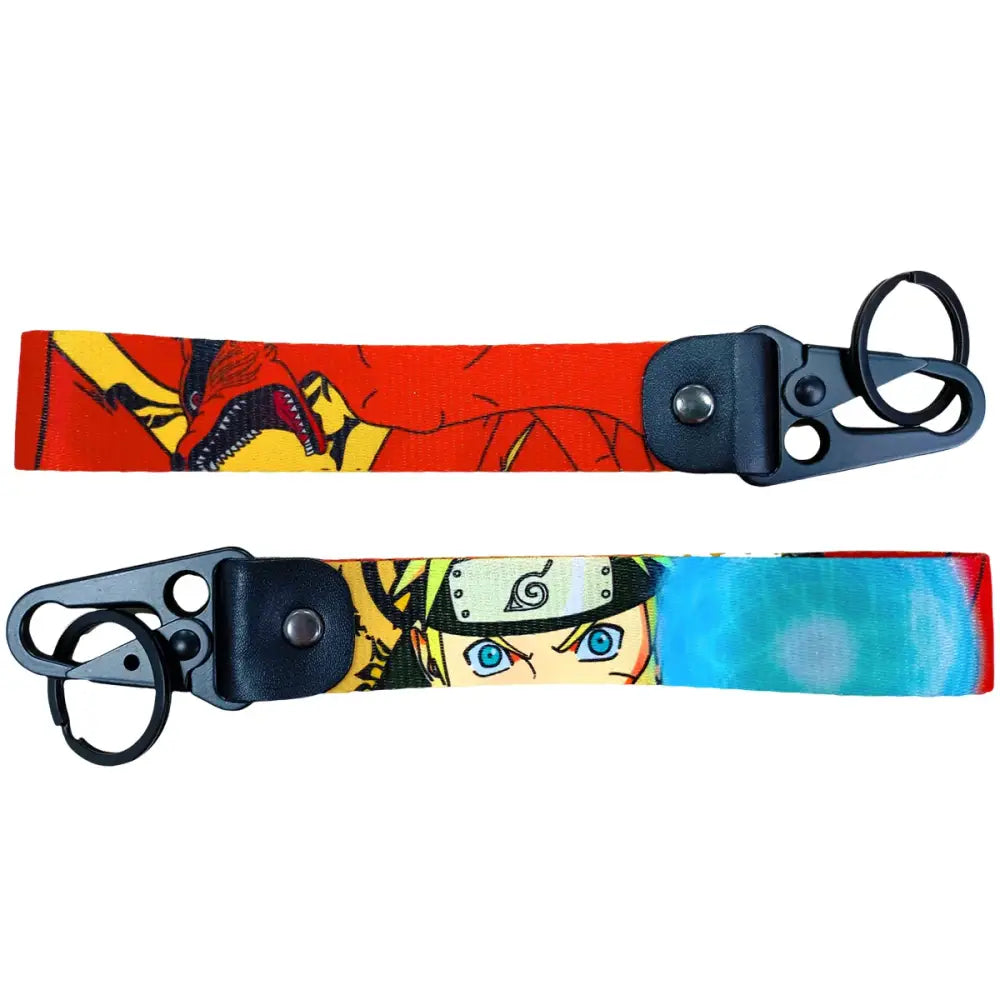 Two colorful anime figure eagle beak keychains with dragon and blue-eyed character designs and metal keyring hardware