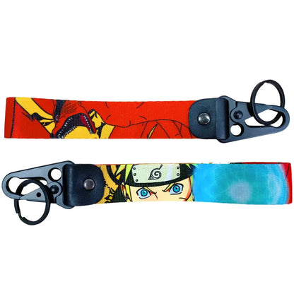 Two colorful anime figure eagle beak keychains with dragon and blue-eyed character designs and metal keyring hardware