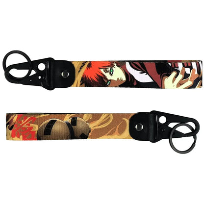 Anime figure eagle beak keychain with red-haired character illustration and black metal keyring hardware