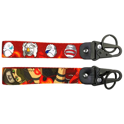 Red and black fabric keychain with anime figure eagle prints featuring a metal keyring and eagle beak design