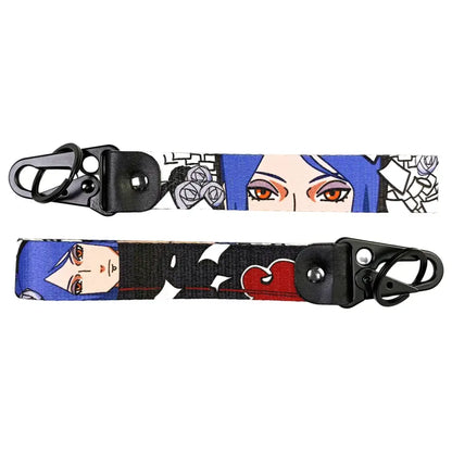 Blue-haired anime figure eagle keychain with black red graphic design metal keyring and durable fabric strap