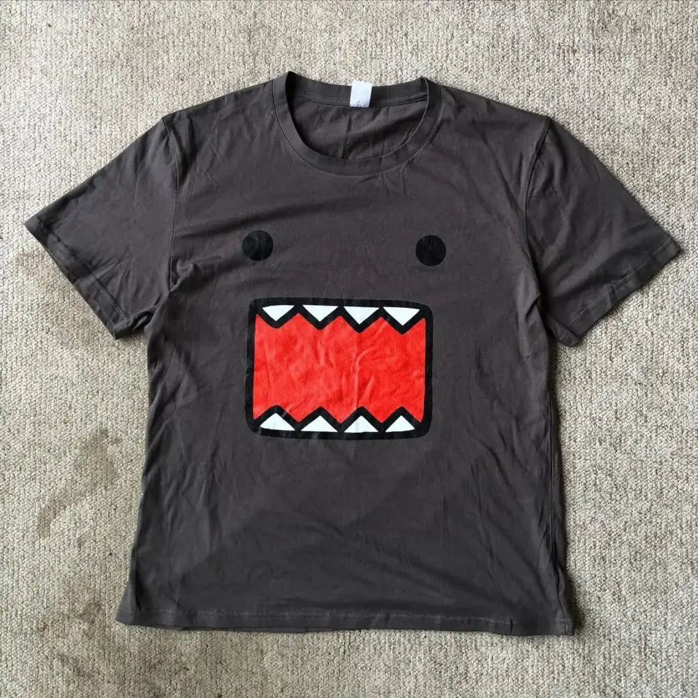 Dark gray y2k anime graphic t-shirt with bold red textured mouth and white teeth in soft cotton material